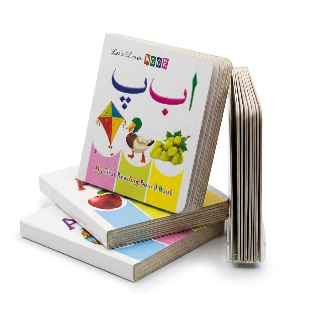Urdu alphabet mini board book standing on stacked books, showing thick pages and rounded corners
Open Urdu alphabet board book with colourful pictures of a lemon, banana, rooster and ball