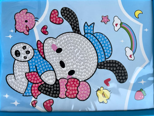 Blue-framed puppy diamond painting board beside a bead packet, pink applicator pen and wax square
